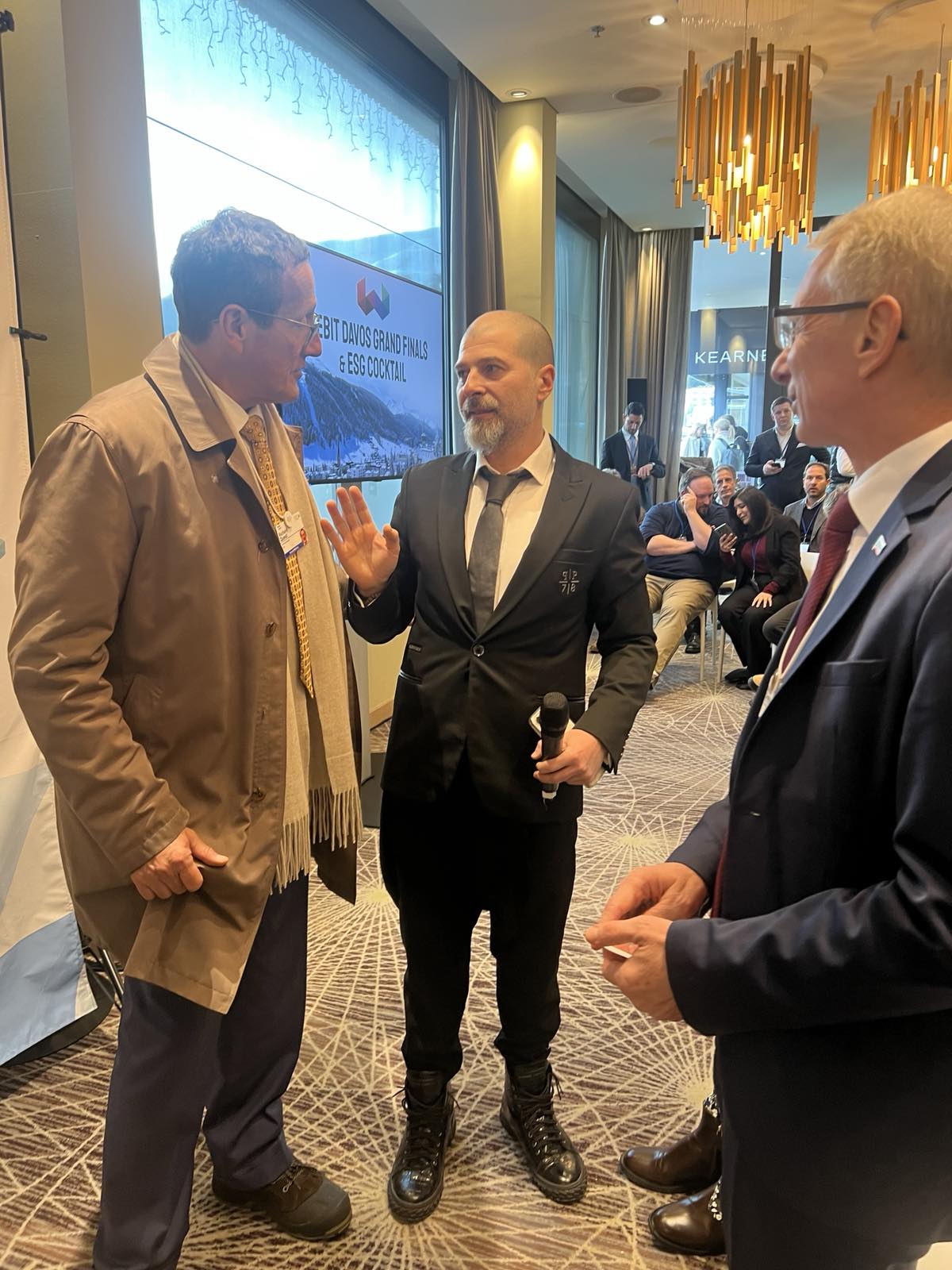 Plamen Russev with Richard Quest of CNN and the Prime Minister of Bulgaria acad. Nikolai Denkov at the Grand Finals of Founders Games in Davos